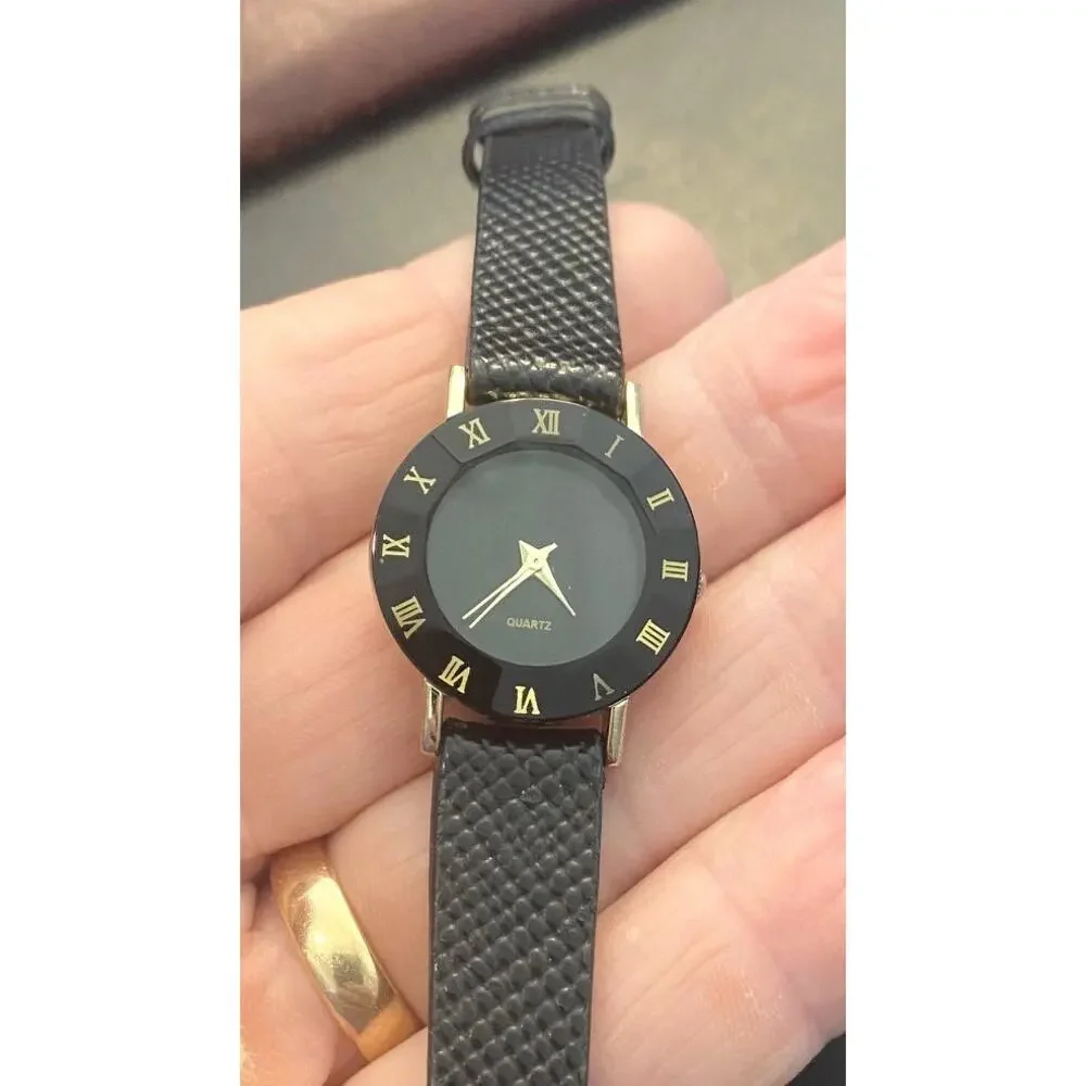 Women's Gold Tone Watch, Black Bezel with Roman Numeral Markings, Black Band